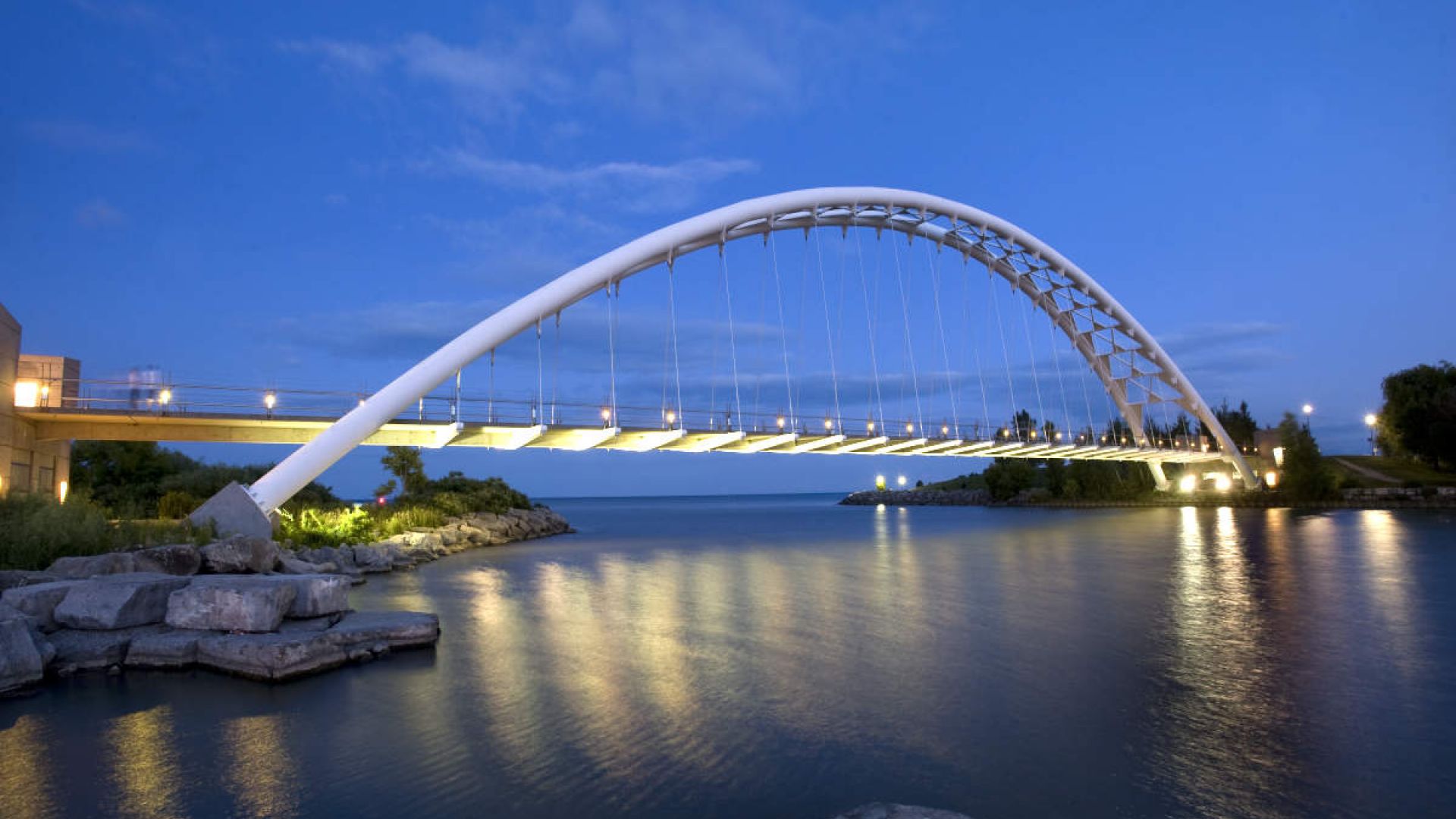 On the shore of Lake Ontario spanning the mouth of the Humber River, the Humber Bay Arch Bridge is a historical gateway connecting what used to be considered Toronto and Etobicoke. Photo: Max Skwarna