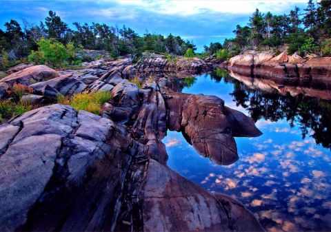 Drumlin rock formations surrounding the French River. 
